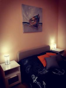 Postel nebo postele na pokoji v ubytování Apartments Luza