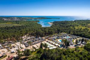 an aerial view of a campground next to a lake at Mobile Homes Camping Santa Marina, Lanterna in Poreč