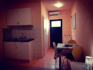 Kuchyň nebo kuchyňský kout v ubytování Apartments Luza