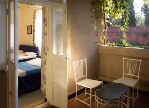Postel nebo postele na pokoji v ubytování Hotel Malas + 37 fotografií