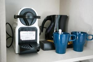 Coffee and tea making facilities at MONKÓ - BANANA & TROPYCAL APARTMENT o