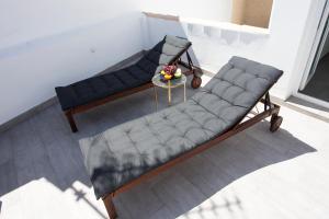 A seating area at MONKÓ - BANANA & TROPYCAL APARTMENT o