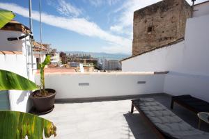 A balcony or terrace at MONKÓ - BANANA & TROPYCAL APARTMENT o