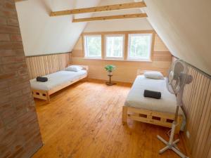 Postel nebo postele na pokoji v ubytování Nature Guest House