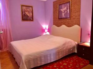 Ένα ή περισσότερα κρεβάτια σε δωμάτιο στο Luxury Apartman Porat