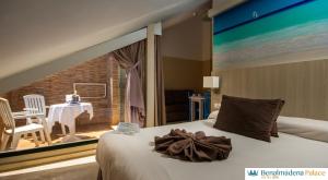 Ein Bett oder Betten in einem Zimmer der Unterkunft Benalmadena Palace Spa