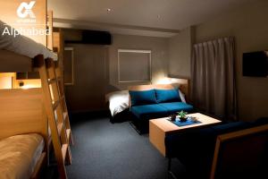Кровать или кровати в номере ALPHABED INN Takamatsuekimae 301 / Vacation STAY 36560
