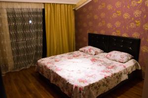 Letto o letti in una camera di Sunrise Hotel