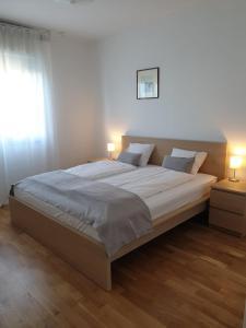 Postel nebo postele na pokoji v ubytování Apartment by B&D