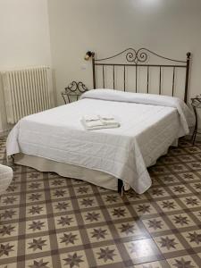 Postel nebo postele na pokoji v ubytování Pietre e Sassi