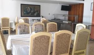 Kuchyň nebo kuchyňský kout v ubytování Hotel María Teresa