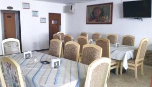 TV a/nebo společenská místnost v ubytování Hotel María Teresa