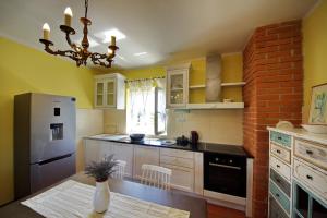 Kuchyň nebo kuchyňský kout v ubytování Apartman Marija
