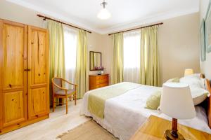 Postel nebo postele na pokoji v ubytování aloha apartments