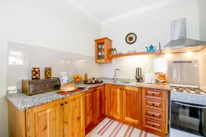 Kuchyň nebo kuchyňský kout v ubytování aloha apartments