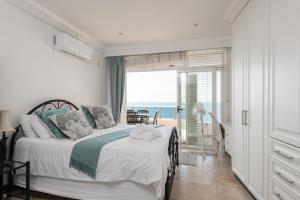 Postel nebo postele na pokoji v ubytování Ballito Manor View 602 - With Generator