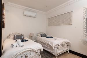 Postel nebo postele na pokoji v ubytování Ballito Manor View 602 - With Generator + 8 fotografií