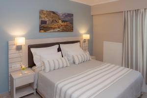 Кровать или кровати в номере Theoxenia Chios Apartments