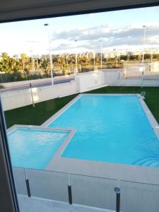 a large swimming pool on the roof of a building at AMAY 880 Nr 38 in Torrevieja