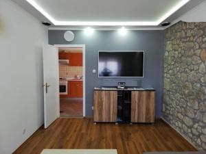 Een TV en/of entertainmentcenter bij Apartment Sidro

