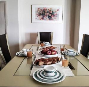 a table with a plate of food on it at Villa Elia in Sfakia +27 photos