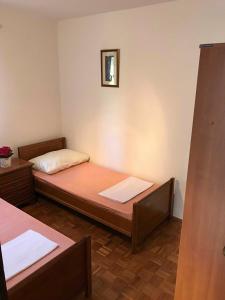 Postel nebo postele na pokoji v ubytování Put Lokvice 50