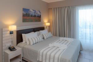 Кровать или кровати в номере Theoxenia Chios Apartments