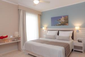 Кровать или кровати в номере Theoxenia Chios Apartments