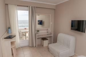 Телевизор и/или развлекательный центр в Theoxenia Chios Apartments