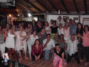 a group of people posing for a picture at a party at Cabañas Maria Maria Conchillas in Conchillas +57 photos
