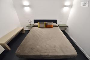 Postel nebo postele na pokoji v ubytování Corte Cairoli B&B and Suites