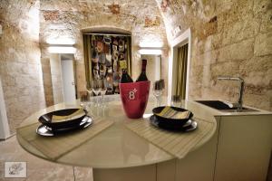 Nápoje v ubytování Corte Cairoli B&B and Suites