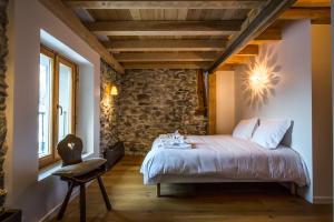 Tempat tidur dalam kamar di Les Iles 1776