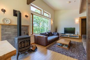 TV a/nebo společenská místnost v ubytování Tsukinoki