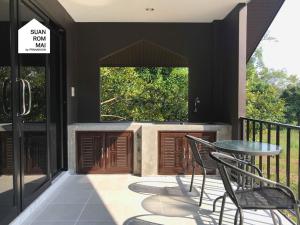 Balkón nebo terasa v ubytování Suan Rom Mai Chanthaburi สวนร่มไม้ จันทบุรี