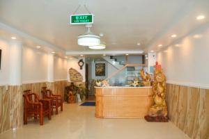 a fast food restaurant with a sign that reads exit buffet at Homestay coco in Vung Tau