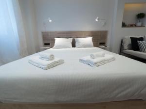 Tempat tidur dalam kamar di Downtown Syntagma apartment 1