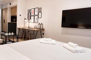A television and/or entertainment centre at Downtown Syntagma apartment 1