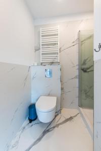 Kúpeľňa v ubytovaní Apartamenty Czwarte Piętro