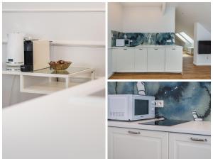 Kuchyňa alebo kuchynka v ubytovaní Apartamenty Czwarte Piętro