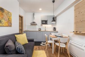 A kitchen or kitchenette at Rika apartments on the seaside