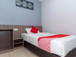 Ένα ή περισσότερα κρεβάτια σε δωμάτιο στο MK Paradise hotel