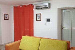 Postel nebo postele na pokoji v ubytování Casa vacanze Porta Garibaldi