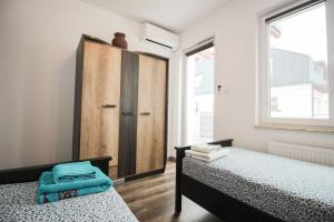 Posteľ alebo postele v izbe v ubytovaní Apartament Lublin Stare Miasto "Wild Cat"