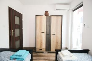 Posteľ alebo postele v izbe v ubytovaní Apartament Lublin Stare Miasto "Wild Cat"