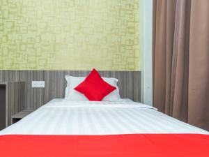 Ένα ή περισσότερα κρεβάτια σε δωμάτιο στο MK Paradise hotel