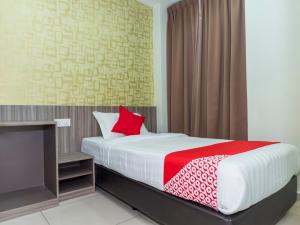 Ένα ή περισσότερα κρεβάτια σε δωμάτιο στο MK Paradise hotel