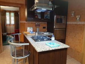 Kuchyň nebo kuchyňský kout v ubytování A Casa do Ferrador