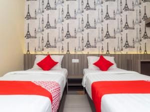 Ένα ή περισσότερα κρεβάτια σε δωμάτιο στο MK Paradise hotel