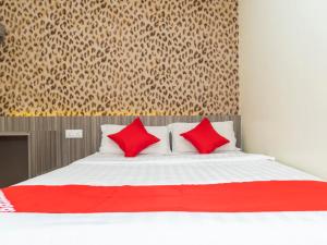 Ένα ή περισσότερα κρεβάτια σε δωμάτιο στο MK Paradise hotel